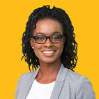 Woman wearing glasses and a gray blazer with a white shirt